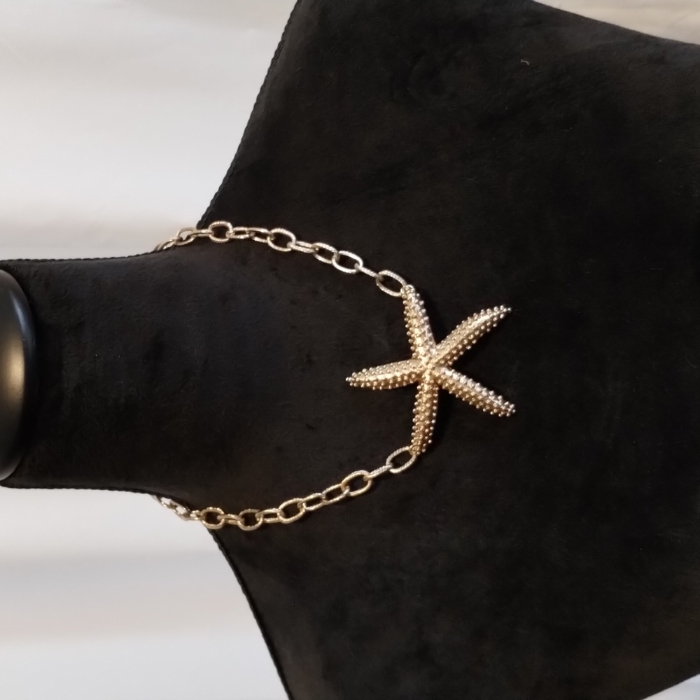 Gold starfish choker type necklace